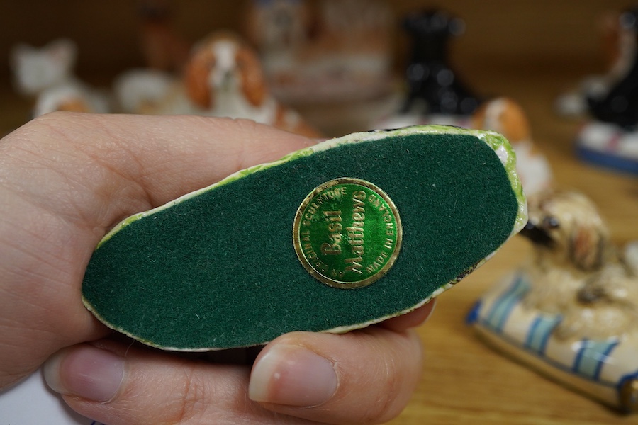 A collection of Basil Matthews figures of dogs, cats, a deer, a foal, pig etc, largest 9.5cm wide